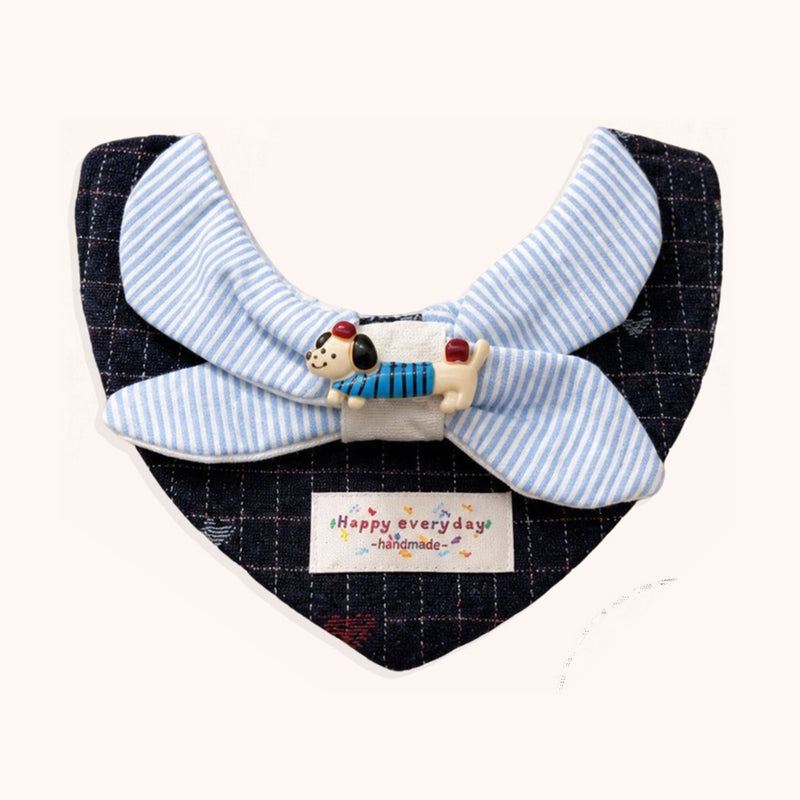 AI-cleaned product photo: Navy Stripe Bow pet bib, navy check with a blue striped bow and a tiny pup charm