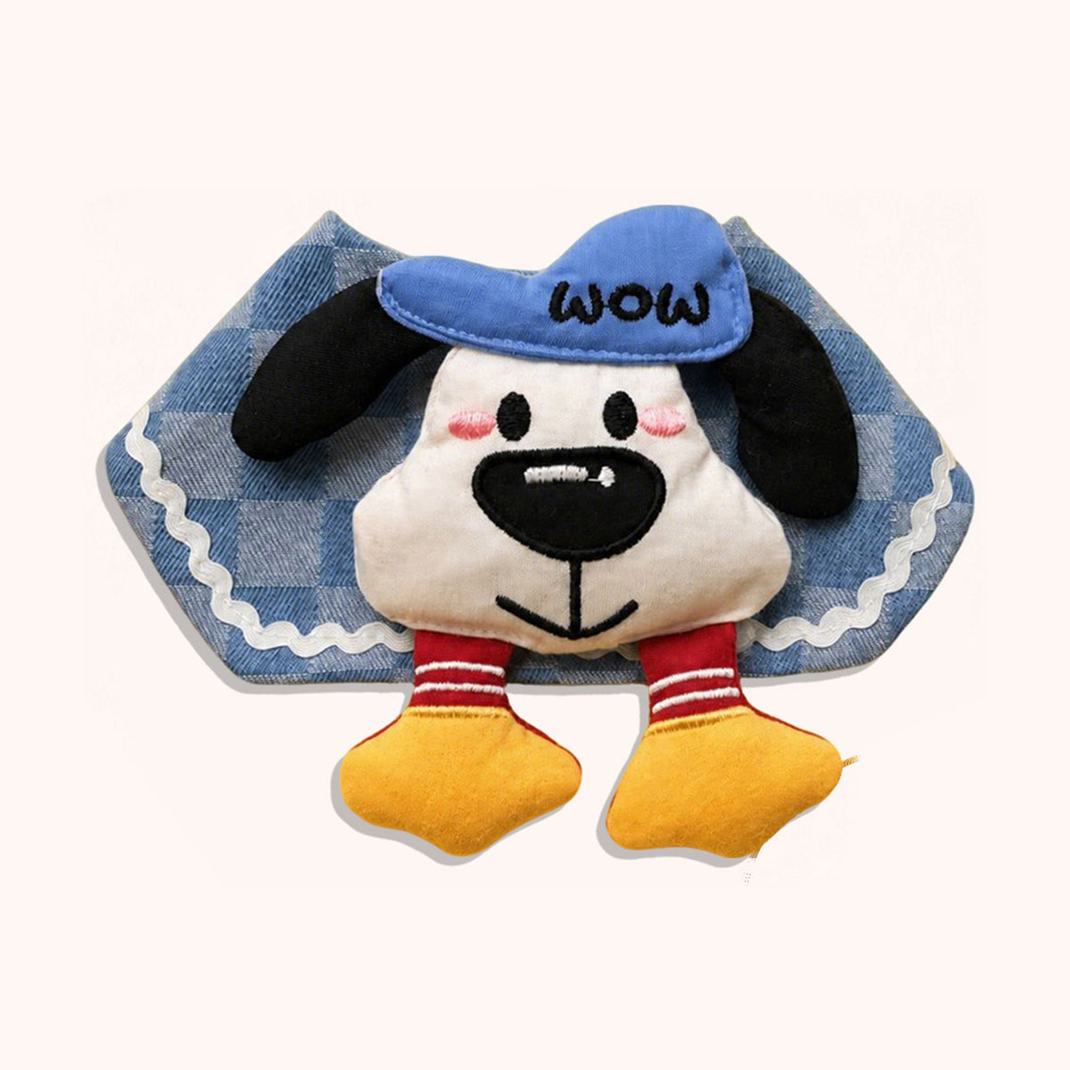 AI-cleaned product photo: Plaid Pup pet bib, blue check with a plush pup face, blue cap and dangling legs