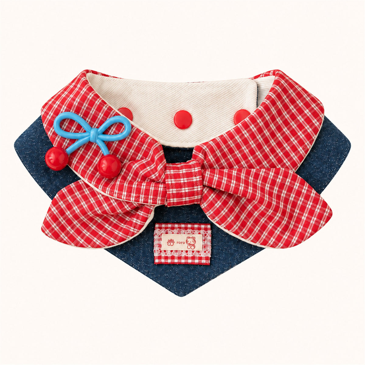 AI-cleaned product photo: Cherry Gingham big bow pet bib, red gingham bow on denim with cherry charms