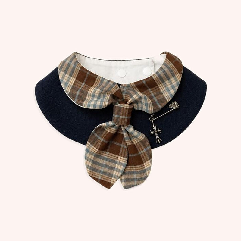Product photo: Brown Plaid Bow Pet Bib — Navy bib with a brown plaid collar, a plaid bow and a silver-tone pin charm.