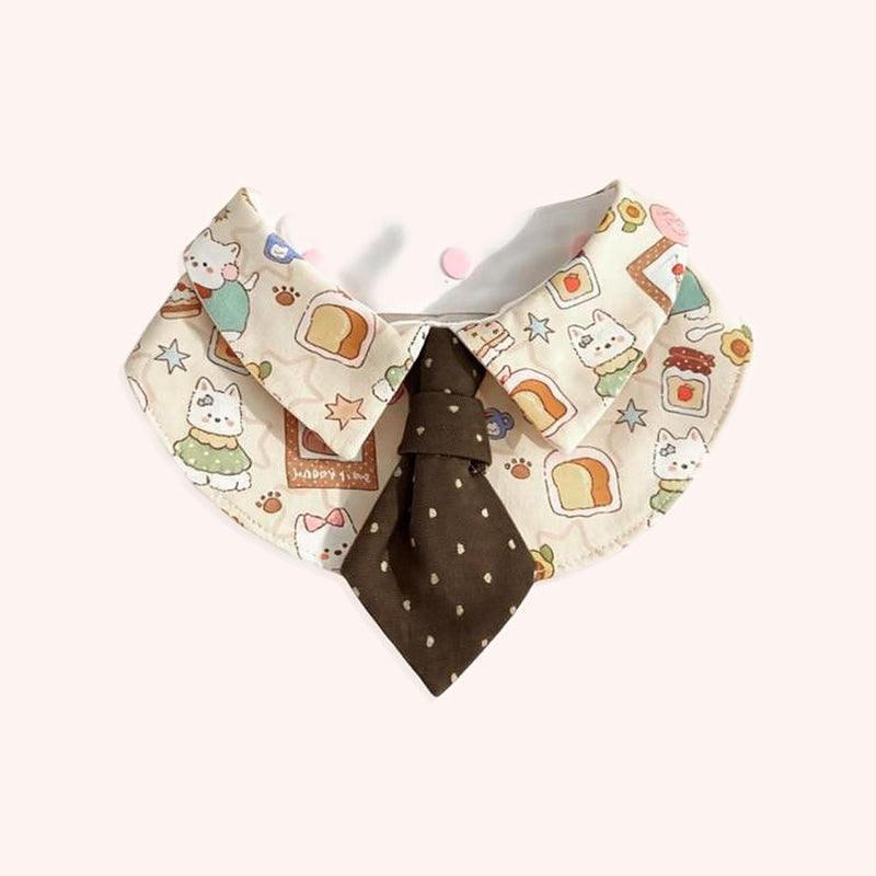 Product photo: Toast Pup Pet Bib — Toast-and-puppy print shirt collar with a chocolate polka-dot tie.