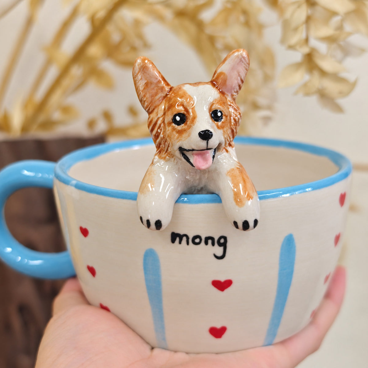AI-cleaned product photo: Over the rim pose, sculpted corgi peeking over the rim
